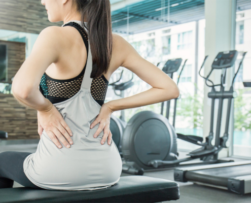 Young Woman With Back Pain